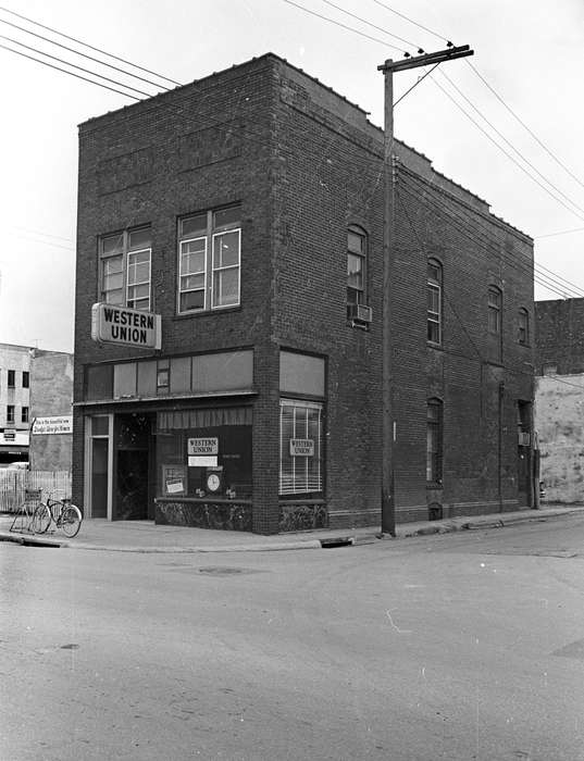 history of Iowa, air conditioner, Lemberger, LeAnn, Ottumwa, IA, clock, store front, bicycle, Cities and Towns, storefront, Businesses and Factories, Iowa, western union, Iowa History