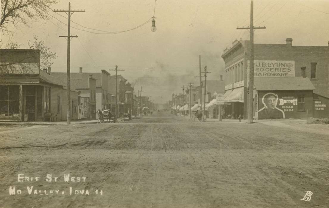horse, road, Palczewski, Catherine, history of Iowa, Missouri Valley, IA, advertisement, Cities and Towns, street light, Main Streets & Town Squares, Iowa, general store, Iowa History, Businesses and Factories, telephone pole, mud