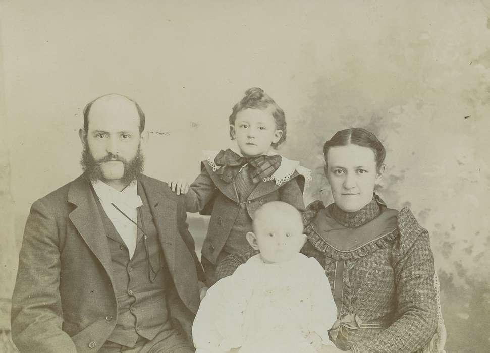 Children, watch chain, Families, baby, mother, Olsson, Ann and Jons, Portraits - Group, family, bow tie, Marengo, IA, cabinet photo, Iowa, muttonchop whiskers, Iowa History, boy, father, history of Iowa, son