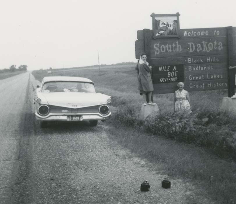 history of Iowa, sign, Heath, Brenda, SD, car, Families, Travel, Iowa, Iowa History, Portraits - Group, Motorized Vehicles