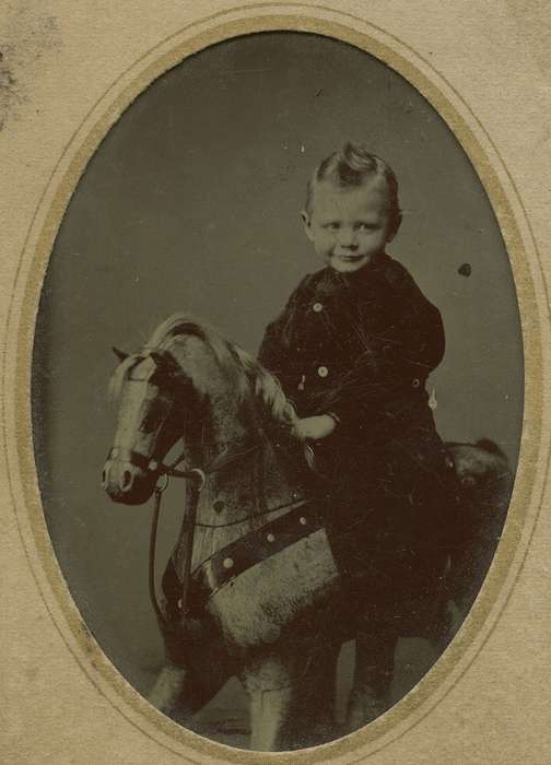 Davenport, IA, Iowa, Animals, horse, child, tintype, Olsson, Ann and Jons, Iowa History, history of Iowa, Children, rocking horse, Portraits - Individual, boy