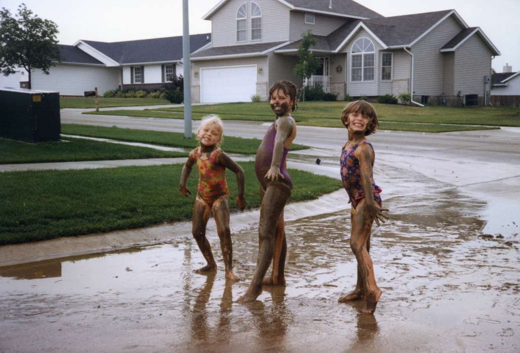 Cities and Towns, Marion, IA, silly, swimsuit, bathing suit, Iowa History, Oakes, Lori, Portraits - Group, mud, street, Leisure, Iowa, history of Iowa, Children