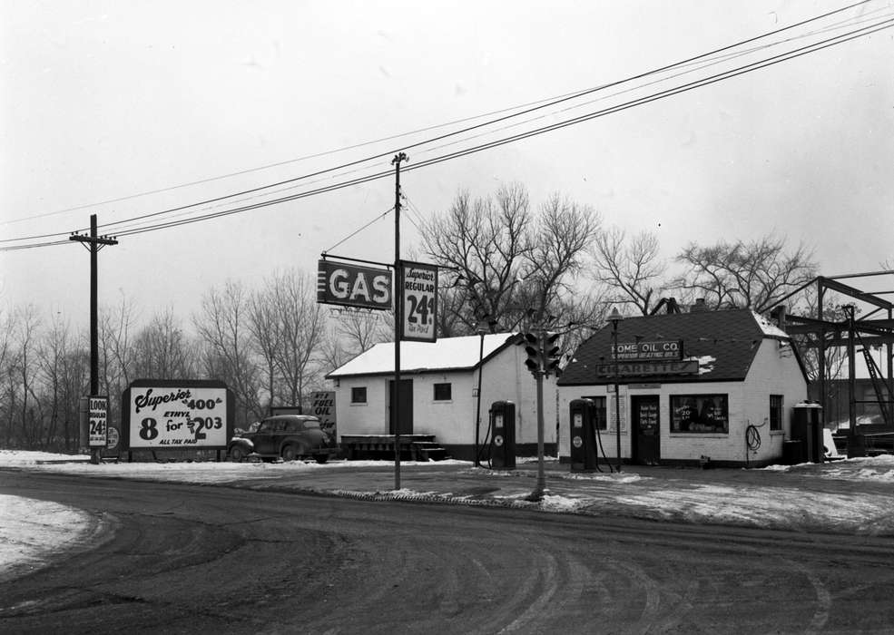 Businesses and Factories, snow, telephone pole, Iowa History, Winter, gas pump, Ottumwa, IA, Iowa, Lemberger, LeAnn, stoplight, Cities and Towns, history of Iowa, gas station, Motorized Vehicles