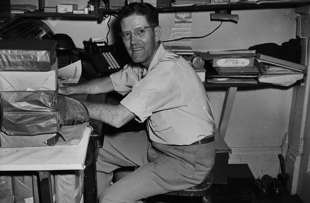 Portraits - Individual, adult man, binder, history, ia, glasses, Photos, Labor and Occupations, Coon Rapids Enterprise, calculator, historic, Iowa, smile