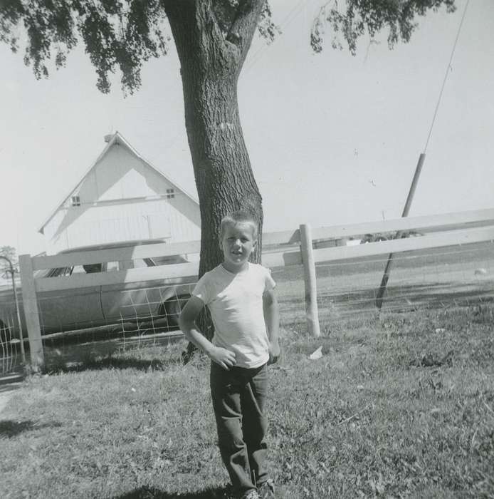 Clarion, IA, boy, Kolb, Elaine, tree, Portraits - Individual, Children, Iowa, Iowa History, fence, history of Iowa, Farms