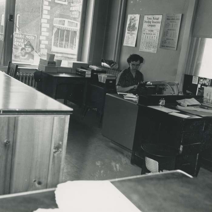desk, poster, Labor and Occupations, radiator, sign, Portraits - Individual, Iowa, worker, Iowa History, lamp, Waverly, IA, history of Iowa, woman, office, Waverly Public Library, calendar, typewriter, trash can, Businesses and Factories, building interior