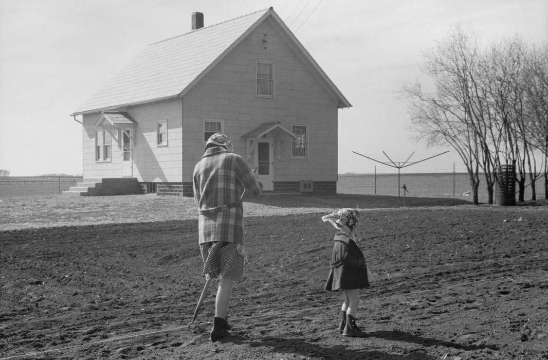 history of Iowa, Homes, Iowa History, Farms, Labor and Occupations, head scarf, farmhouse, Families, boots, Iowa, hoe, Children, gardening, coats, Library of Congress, Farming Equipment