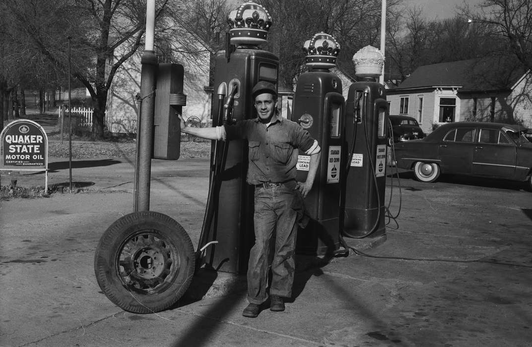 Businesses and Factories, employee, history, Photos, Labor and Occupations, Iowa, IA, Cities and Towns, gas station, Motorized Vehicles, Portraits - Individual, United States, tire, ia, crown, Coon Rapids Enterprise, historic, gas pump, cars, Coon Rapids