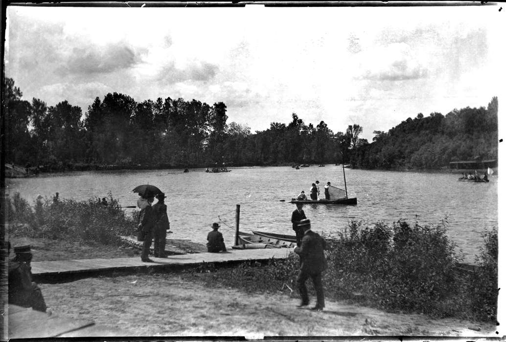 forest, Lakes, Rivers, and Streams, Lemberger, LeAnn, Iowa History, river, Civic Engagement, protest, boat, Iowa, Ottumwa, IA, history of Iowa, dock, umbrella