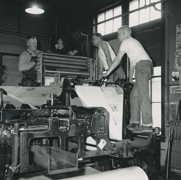 worker, Waverly, IA, Iowa, Waverly Public Library, machinery, Portraits - Group, printing, correct date needed, Iowa History, overalls, history of Iowa, newspaper, press, building interior, Businesses and Factories, Labor and Occupations, man