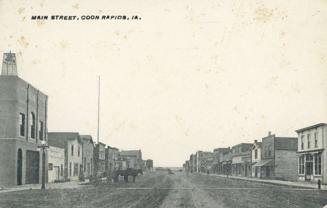Businesses and Factories, flagpole, brick building, horse, awning, cart, Coon Rapids Enterprise, dirt road, street lamp, Animals, Cities and Towns, Main Streets & Town Squares