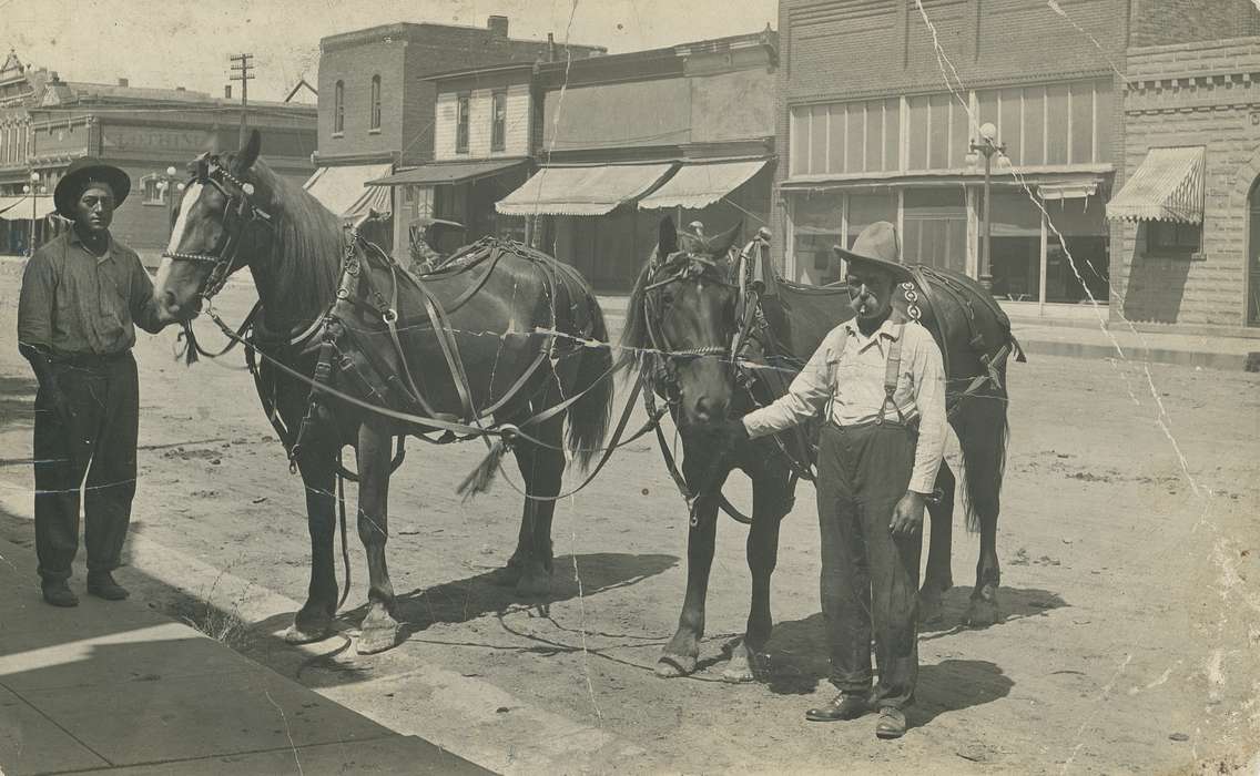 Labor and Occupations, Businesses and Factories, horse, saddle, Outdoor Recreation, awning, Coon Rapids Enterprise, Portraits - Group, dirt road, street lamp, Animals, Cities and Towns, correct date needed, Main Streets & Town Squares