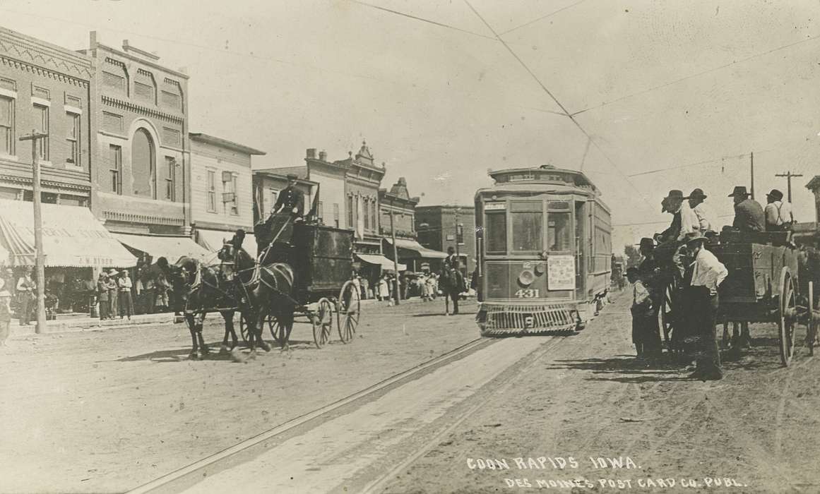 Businesses and Factories, Families, brick building, horse, awning, cart, Coon Rapids Enterprise, train, Portraits - Group, dirt road, Entertainment, Children, Animals, Cities and Towns, correct date needed, Main Streets & Town Squares