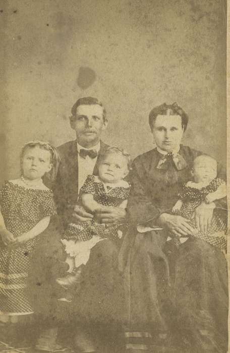 children, pantaloons, Olsson, Ann and Jons, family, sisters, Portraits - Group, toddler, woman, carte de visite, history of Iowa, dropped shoulder seams, necklace, Iowa History, Iowa, dress, hoop skirt, child, Belle Plaine, IA, Children, man, girl, baby, Families, earrings, siblings