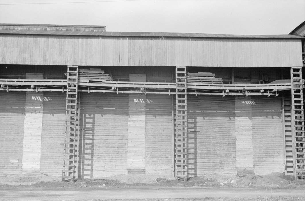 ladder, history of Iowa, Businesses and Factories, Library of Congress, ice plant, Iowa History, wooden building, Iowa