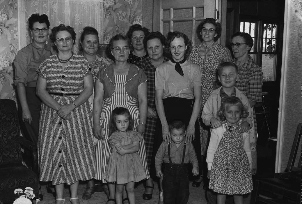 Coon Rapids, girl, Photos, Coon Rapids Enterprise, history, ia, Civic Engagement, Portraits - Group, Iowa, Farms, boy, picking bee, Homes, woman, dress, Families, women, IA, Children, living room, Labor and Occupations, historic, "help your neighbor" club, United States