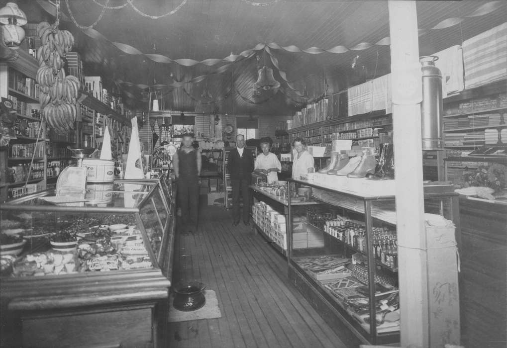 general store, Iowa, Davenport, IA, banana, Portraits - Group, Becker, Alfred, Families, Iowa History, history of Iowa, streamers, display case, Businesses and Factories, store, Labor and Occupations