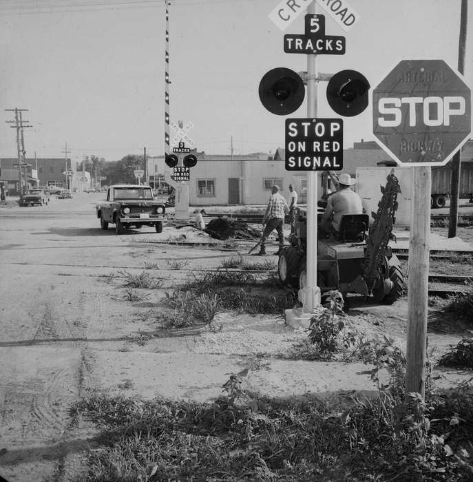 IA, Cities and Towns, historic, Motorized Vehicles, railroad crossing, train tracks, railroad track, Coon Rapids, stop sign, Iowa, United States, Photos, Labor and Occupations, history, Main Streets & Town Squares, Train Stations, railroad track with construction material, ia, Coon Rapids Enterprise