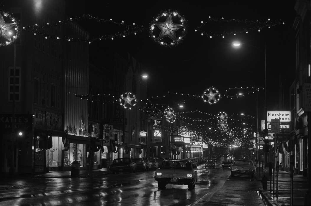 Businesses and Factories, Holidays, street light, Iowa History, mainstreet, christmas decorations, sign, car, Winter, Iowa, Ottumwa, IA, Lemberger, LeAnn, Main Streets & Town Squares, Cities and Towns, history of Iowa, Motorized Vehicles, christmas