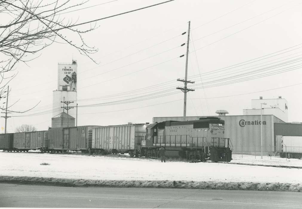 power line, Businesses and Factories, snow, factory, Waverly Public Library, carnation, Iowa History, Waverly, IA, Winter, Iowa, winter, train, Motorized Vehicles, history of Iowa