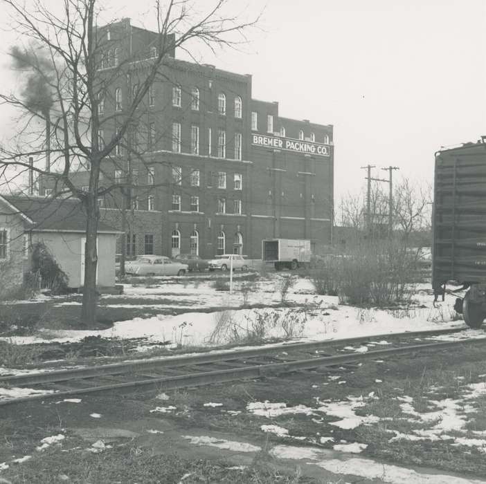 brick building, car, Businesses and Factories, snow, correct date needed, railroad track, Waverly Public Library, chicken processing plant, Iowa History, truck, Waverly, IA, Winter, Iowa, Motorized Vehicles, history of Iowa