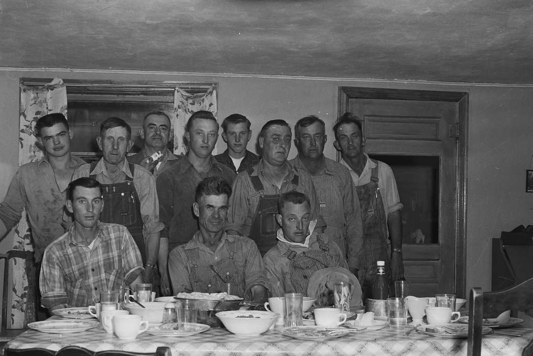 Coon Rapids, Photos, dinner, Coon Rapids Enterprise, ia, Civic Engagement, Portraits - Group, history, Iowa, Farms, picking bee, overalls, kitchen, farmer, IA, tractor, Food and Meals, Labor and Occupations, historic, "help your neighbor" club, United States, table