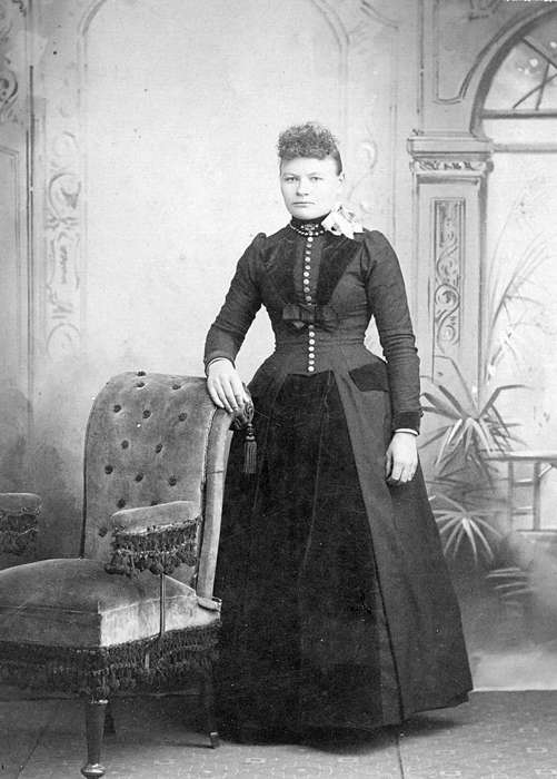 painted backdrop, dress, frizzy bangs, history of Iowa, necklace, Portraits - Individual, Iowa, Iowa History, brooch, chair, Fuller, Steven, Dike, IA
