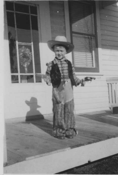 cowboy costume, costume, Children, Iowa History, porch, gun, Vaughn, Cindy, Portraits - Individual, Iowa, Cedar Rapids, IA, history of Iowa