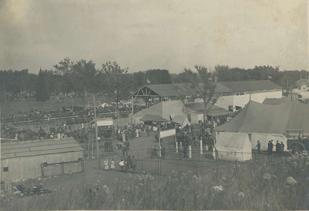 county fair, ladder, Iowa, Iowa History, horse and buggy, fence, Waverly, IA, Aerial Shots, history of Iowa, tents, Waverly Public Library, buildings, bicycle, fences, wooden fence, cars, horse, tractor, Fairs and Festivals