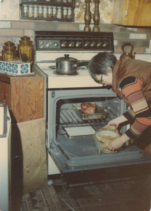 Olsson, Ann and Jons, kitchen, oven, cooking, Waterloo, IA, Food and Meals, history of Iowa, Iowa History, woman, Families, Iowa