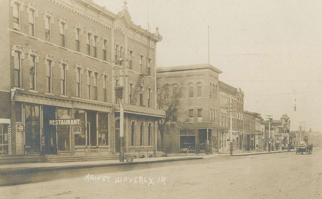 Waverly, IA, Animals, horse and cart, sign, postcard, window, Iowa, Waverly Public Library, Main Streets & Town Squares, Cities and Towns, post card, clock, correct date needed, Iowa History, history of Iowa, building, Businesses and Factories, brick building, pole, horse