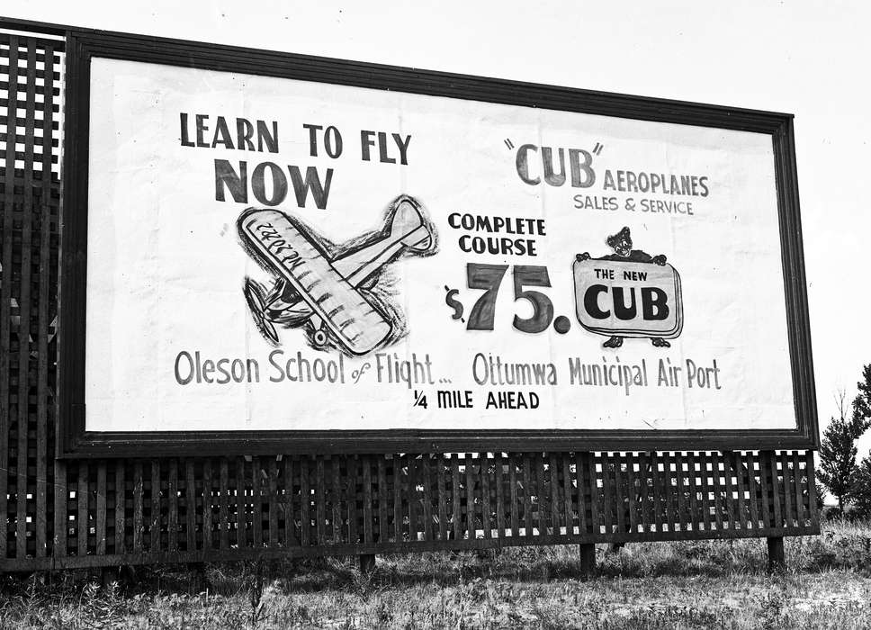 advertisement, Lemberger, LeAnn, billboard, Ottumwa, IA, history of Iowa, sign, Iowa, Iowa History, airplane, Businesses and Factories