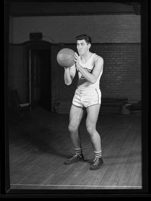 Iowa History, Archives & Special Collections, University of Connecticut Library, history of Iowa, man, basketball, player, gymnasium, Storrs, CT, Iowa