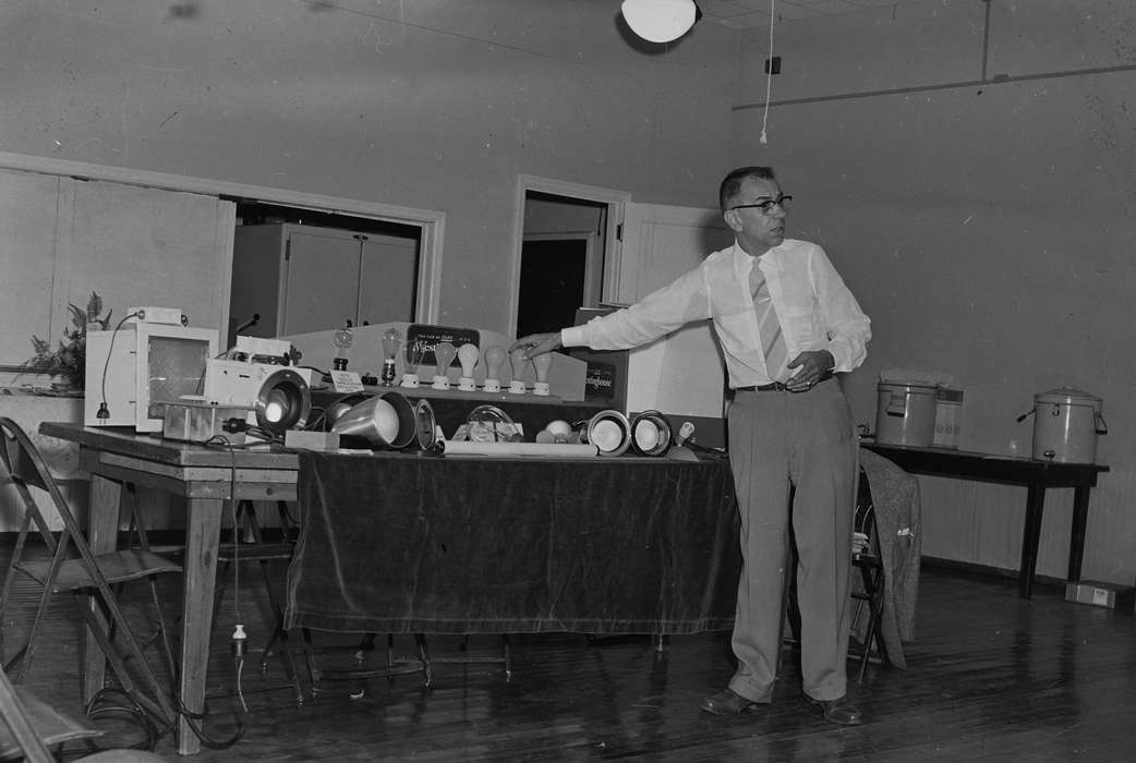 Schools and Education, Businesses and Factories, United States, history, ia, Photos, Labor and Occupations, business, man, lightbulb, Coon Rapids Enterprise, historic, Iowa, IA, Coon Rapids, show