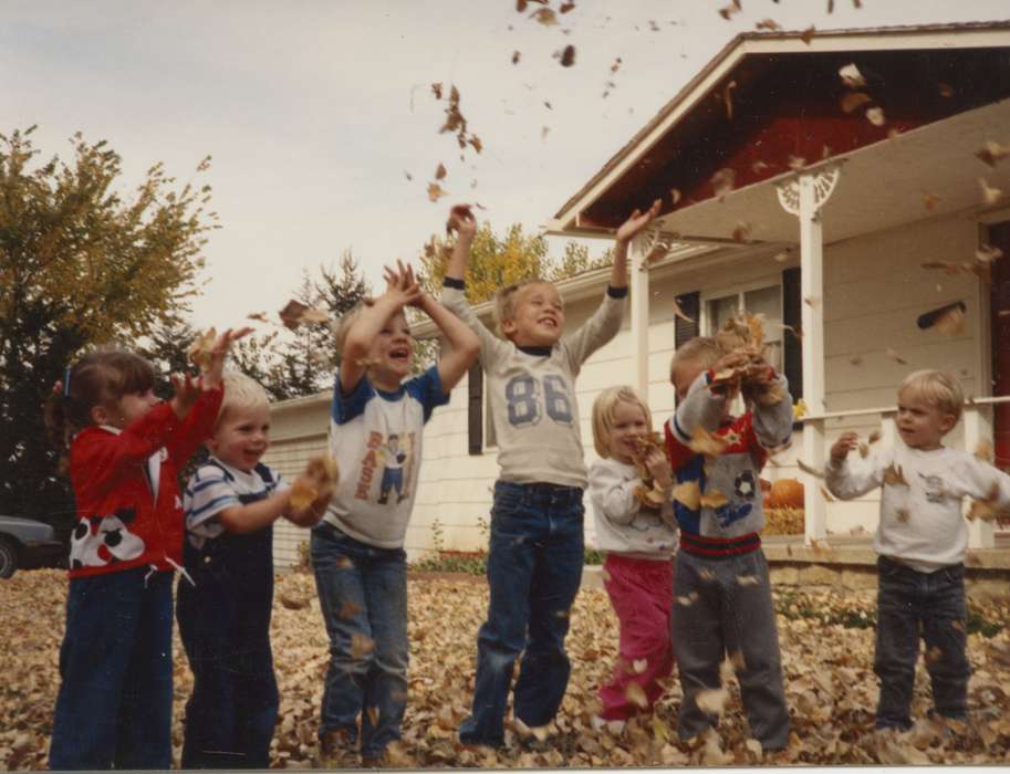 happy, outdoors, Children, throwing, fall, leaves, Iowa History, Leisure, Portraits - Group, Ring, Jana, leaf pile, Iowa, Neola, IA, history of Iowa
