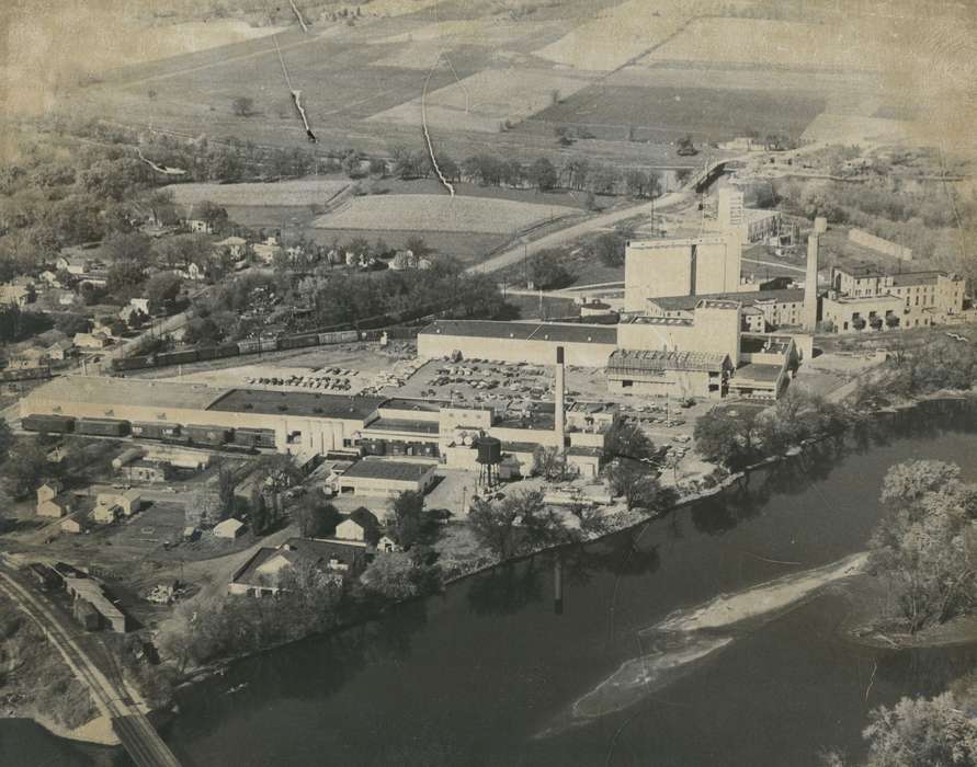 Cities and Towns, car, tree, Businesses and Factories, Waverly Public Library, parking lot, river, Waverly, IA, Iowa History, Lakes, Rivers, and Streams, Iowa, Aerial Shots, history of Iowa, building