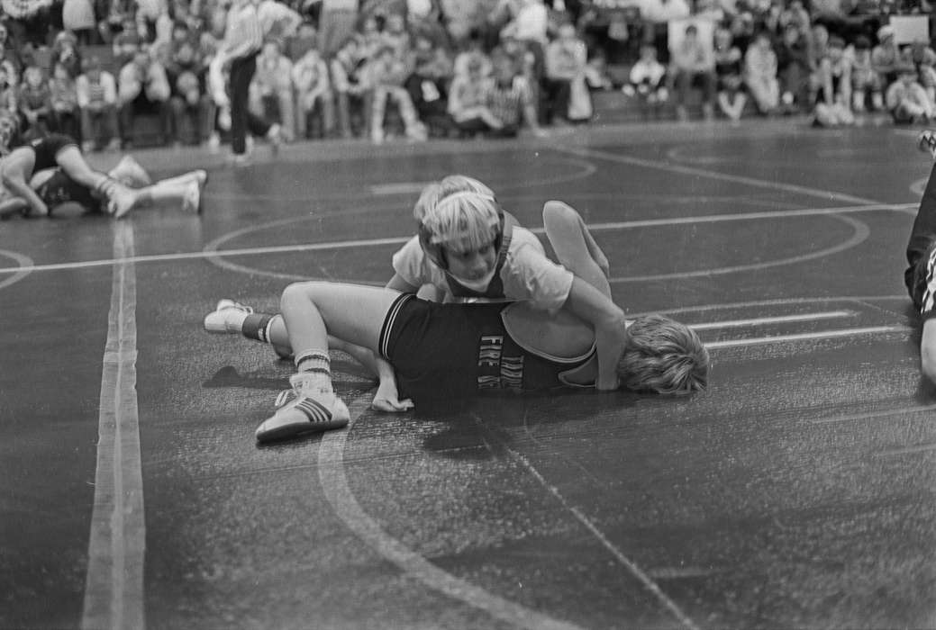 Coon Rapids Enterprise, Coon Rapids, student, competition, Winter, historic, Schools and Education, audience, boy, ia, athlete, gymnasium, Iowa, sports, Sports, wrestling, United States, Children, history, Photos, IA, classroom