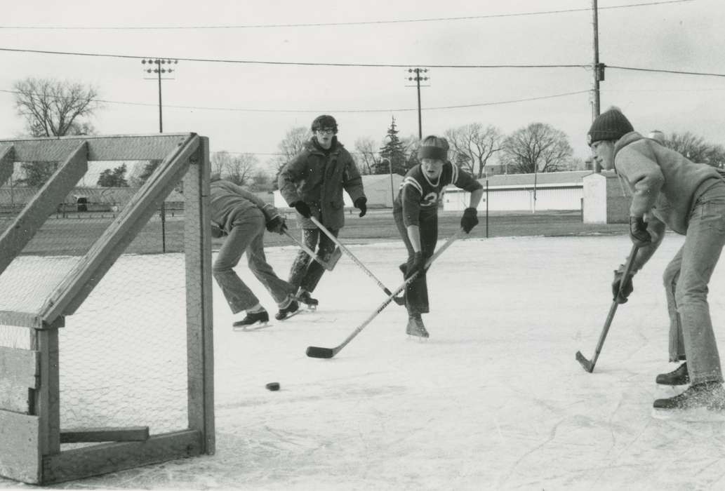 Waverly Public Library, Iowa History, history of Iowa, young men, hockey, ice skates, Iowa, Winter