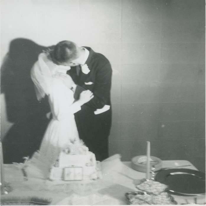cake, wedding dress, Weddings, kiss, Iowa History, bride, groom, Iowa, Council Bluffs, IA, Ring, Jana, history of Iowa