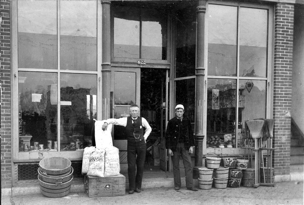 Businesses and Factories, Labor and Occupations, grocery store, broom, Iowa History, bucket, Portraits - Group, Iowa, Ottumwa, IA, Lemberger, LeAnn, window, grain, store, history of Iowa, men