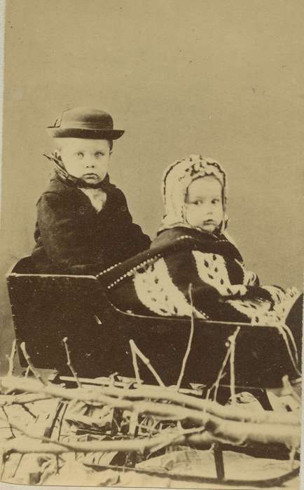 branches, children, Independence, IA, Olsson, Ann and Jons, Children, Portraits - Group, bonnet, carte de visite, history of Iowa, Iowa History, Iowa, sled, boy, siblings, Winter, hat