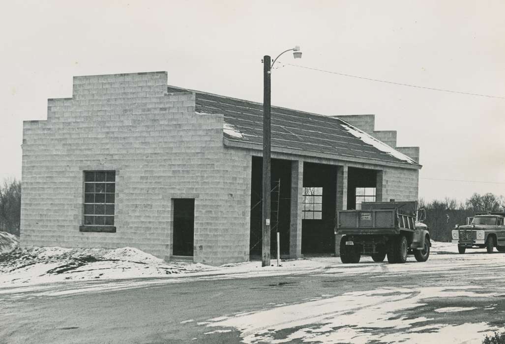 brick building, snow, correct date needed, Waverly Public Library, Iowa History, Iowa, Motorized Vehicles, history of Iowa, dump truck, melting snow
