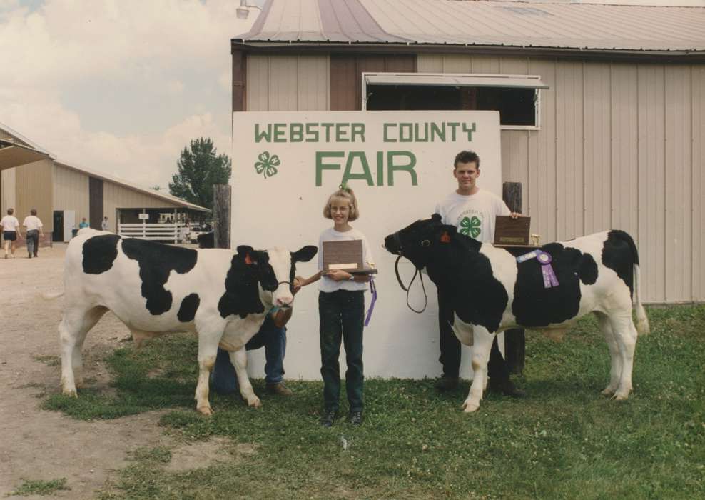 county fair, cow, Iowa, Stewart, Phyllis, Portraits - Group, ribbons, 4-h, award, Iowa History, history of Iowa, Fort Dodge, IA, Fairs and Festivals, Children, cows