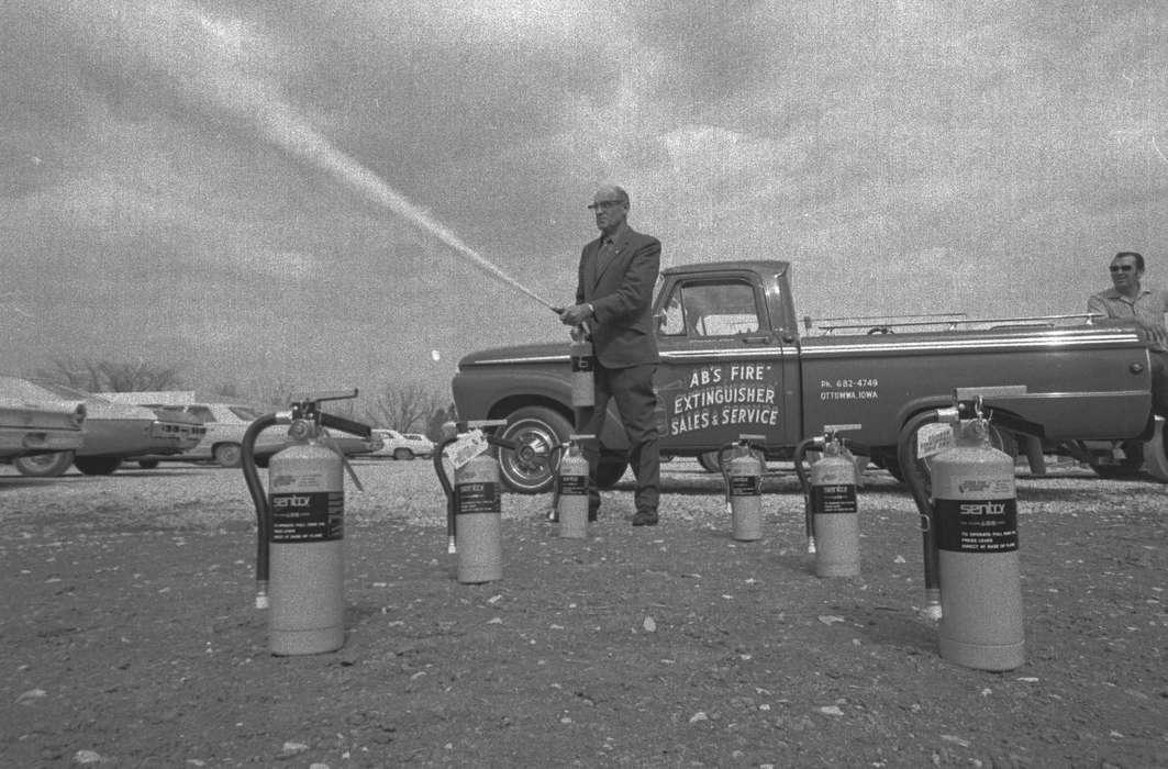 Businesses and Factories, Iowa, Motorized Vehicles, suit, parking lot, truck, Iowa History, spray, history of Iowa, Lemberger, LeAnn, Ottumwa, IA, fire extinguisher