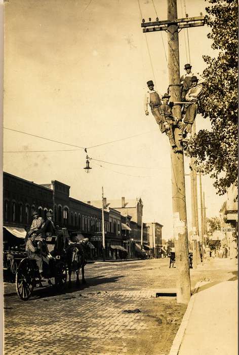 telephone pole, Cities and Towns, Iowa History, Portraits - Group, Main Streets & Town Squares, Anamosa, IA, Labor and Occupations, Iowa, Anamosa Library & Learning Center, history of Iowa, cobblestone