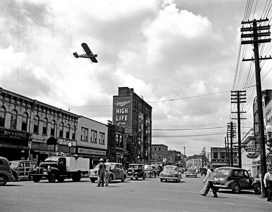 Cities and Towns, Lemberger, LeAnn, Iowa History, history of Iowa, Ottumwa, IA, Main Streets & Town Squares, Motorized Vehicles, airplane, Iowa, miller high life