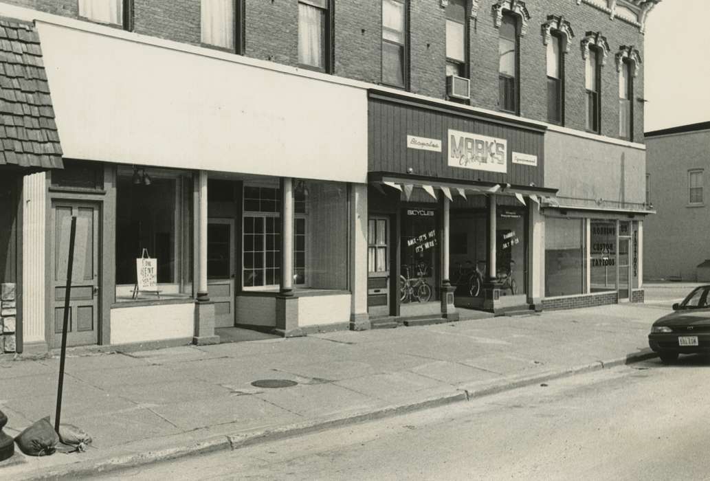storefront, Businesses and Factories, history of Iowa, Waverly Public Library, Iowa, Iowa History, brick building, bicycle, Cities and Towns, Main Streets & Town Squares, store