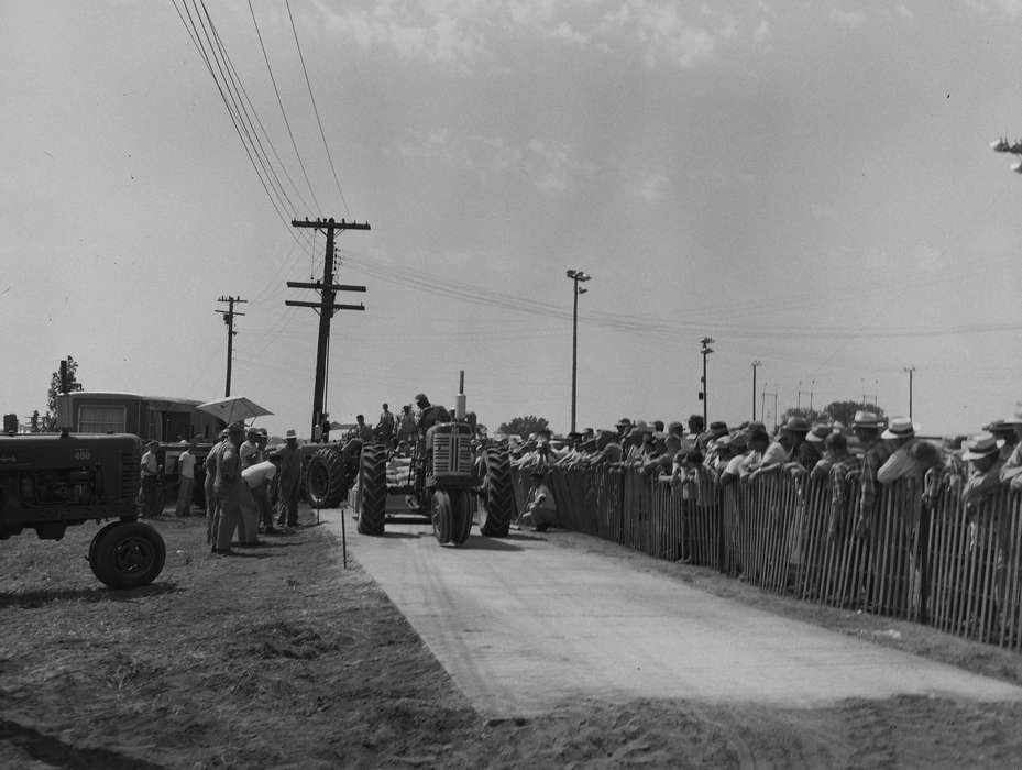 Portraits - Group, tractor, Families, United States, history, ia, Farming Equipment, Entertainment, Photos, Coon Rapids Enterprise, tractor pull, historic, Iowa, IA, Fairs and Festivals, Coon Rapids, Motorized Vehicles