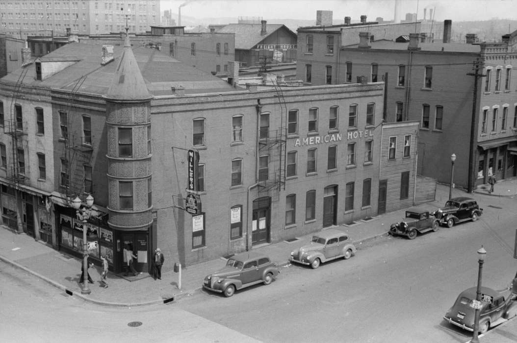 fire escape, sidewalk, Cities and Towns, Library of Congress, cars, street light, corner, Iowa History, history of Iowa, lamppost, car, Iowa, Businesses and Factories