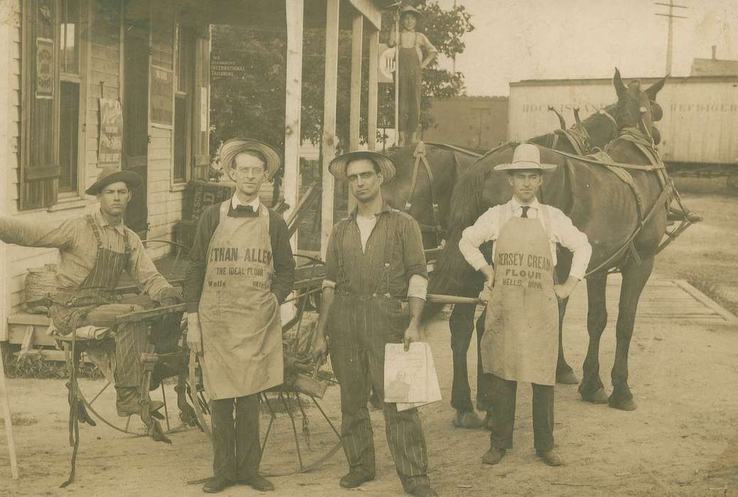 Farming Equipment, Iowa History, Portraits - Group, apron, men, Animals, Labor and Occupations, Iowa, history of Iowa, Businesses and Factories, horse, cabinet photo, cultivator, storefront, straw hat, Main Streets & Town Squares, boy, train car, Olsson, Ann and Jons, Fruitland, IA